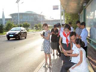 At a bus stop of Sci-Tech Complex